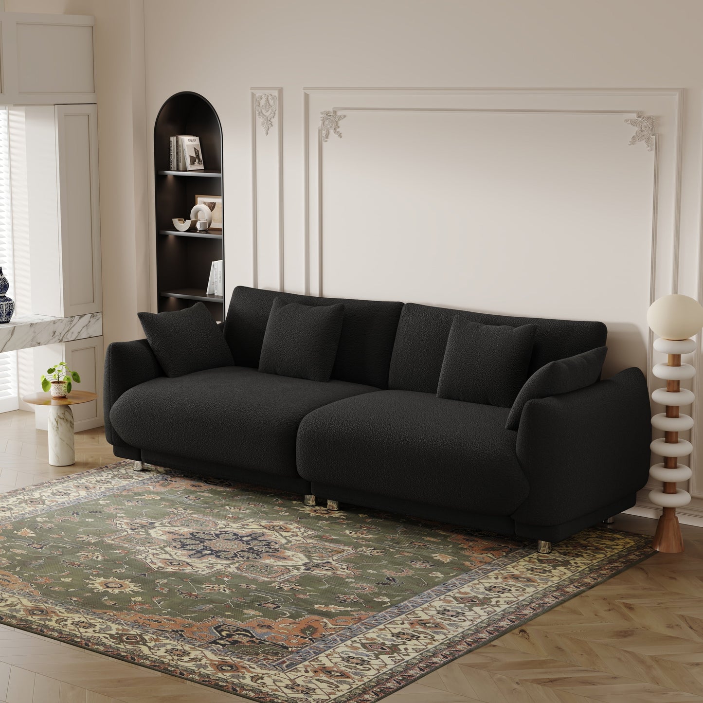 An 86.6-inch teddy wool green sofa with four throw pillows and hardware feet that can sit comfortably in an apartment bedroom wi
