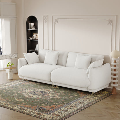 An 86.6-inch teddy wool green sofa with four throw pillows and hardware feet that can sit comfortably in an apartment bedroom wi